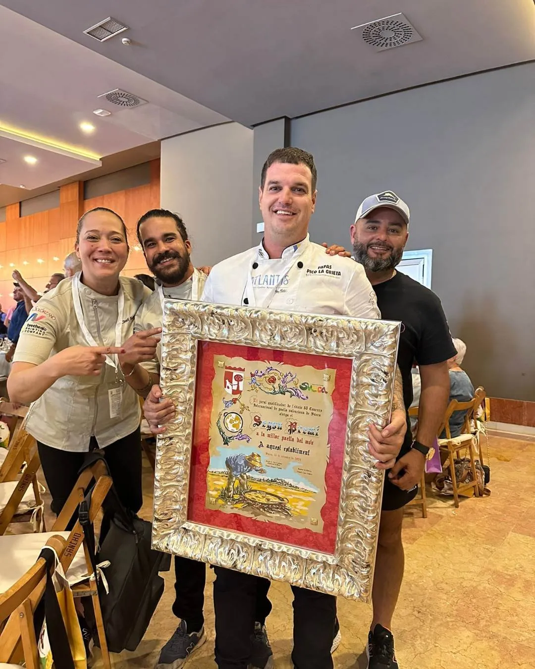 The Atlantis restaurant team poses with the second-place diploma from Sueca