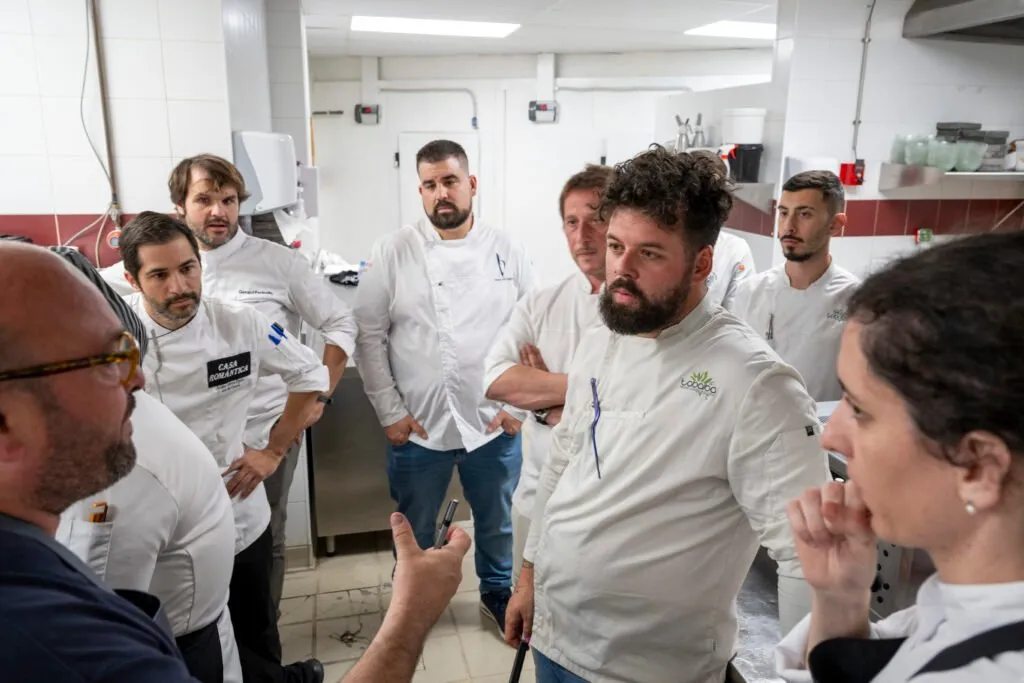 The chefs greeting guests as the service comes to an end