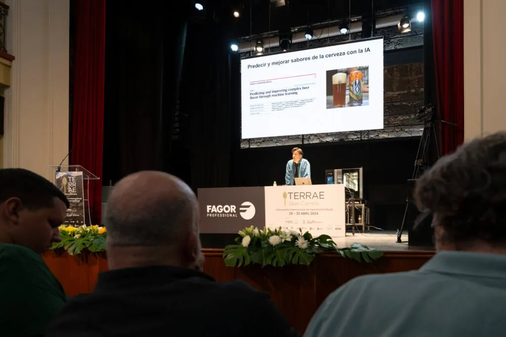 Presentation on artificial intelligence applied to flavour, with the slides projected