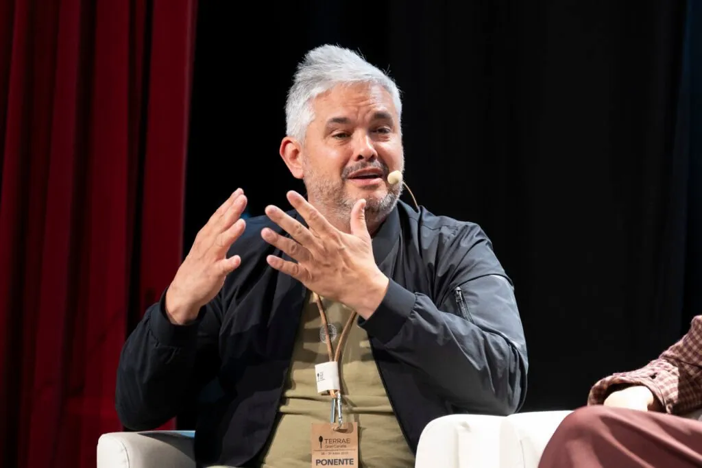 Round table participant gesturing during his contribution