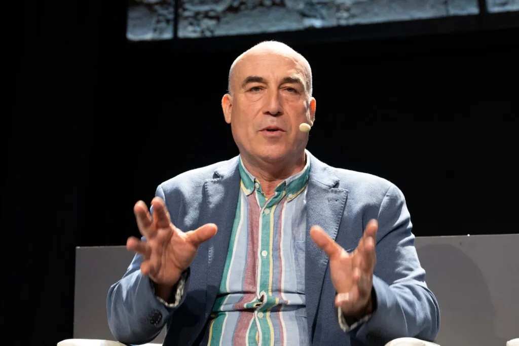 A round table participant explaining his point of view