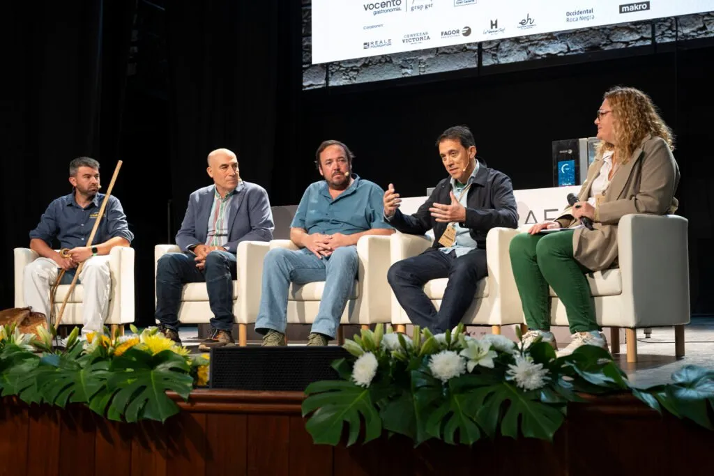 The five round table participants during the debate