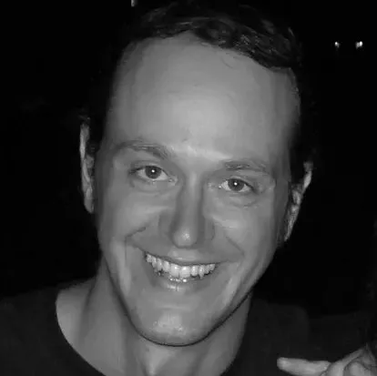 Black-and-white portrait of Hervé Bouy